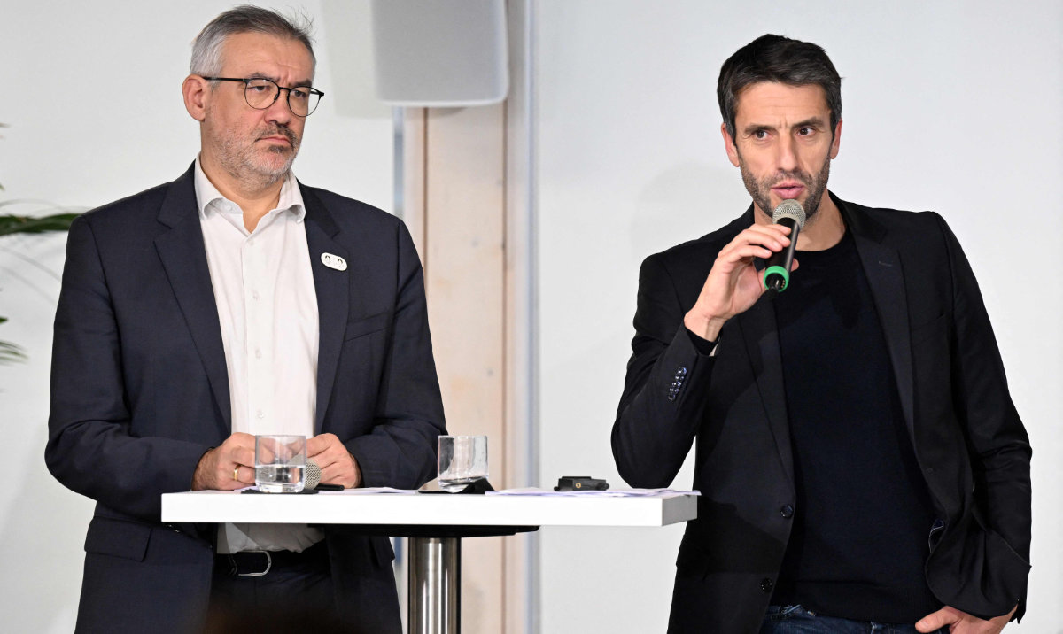 French President of the Paris 2024 Olympics Organizing Committee Tony Estanguet (R) speaks next to the Committee's Director General Etienne Thobois during a press conference on the 2023 review and 2024 outlook at the headquarters of the Paris 2024 Olympics on Dec. 20, 2023. (AFP)