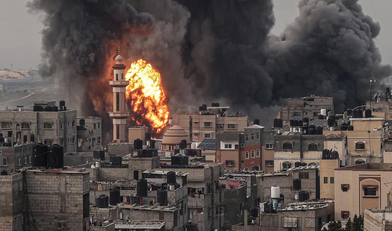 Smoke billows after an Israeli strike over Rafah in the southern Gaza Strip on December 20, 2023. (AFP)
