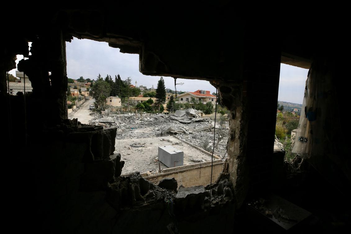 A picture taken from inside a damaged building shows the aftermath of an Israeli bombardment in Lebanon’s southern village of Markaba near the border with Israel on Dec. 20, 2023. (Photo by AFP)