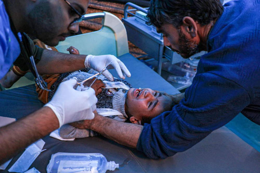 Some patients at Al-Ahli had been waiting for surgeries for weeks or if they had been operated on, they faced the risk of a post-operation infection. (File/AFP)