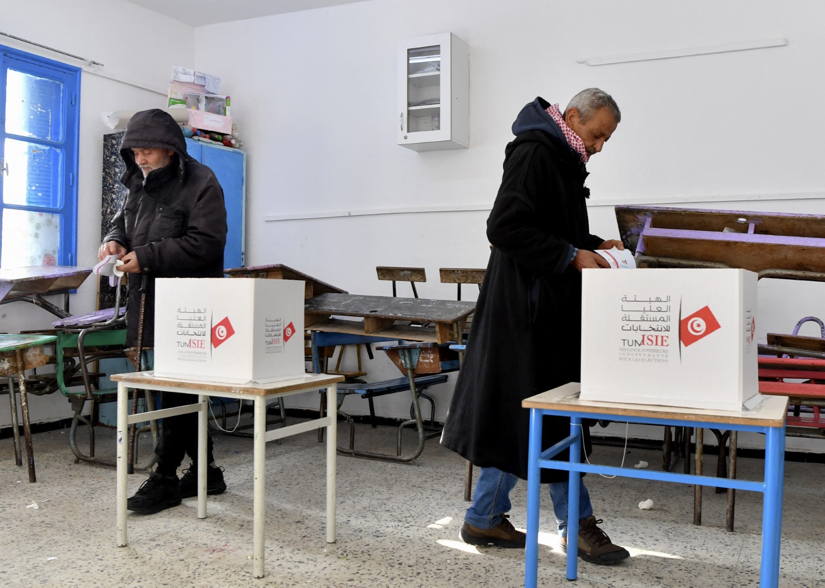 File from Tunisian voters cast their ballots in the second round of parliamentary elections on January 29, 2023 (AFP)