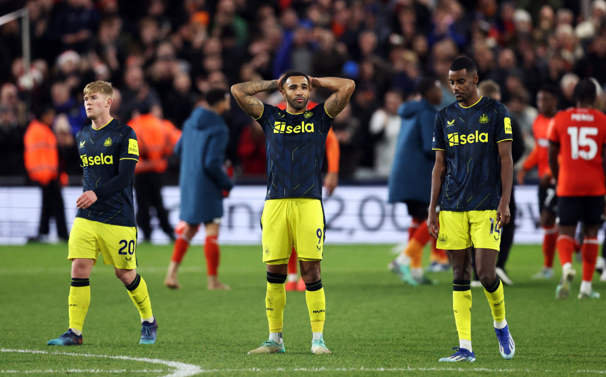 Newcastle United's Lewis Hall, Callum Wilson and Alexander Isak look dejected after their loss to Luton Town on December 23, 2023. (REUTERS)