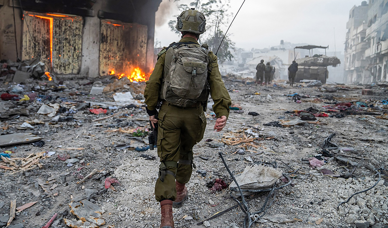 This handout picture released by the Israeli army on December 22, 2023 shows a soldier operating in the Gaza Strip, amid continuing battles between Israel and the Palestinian group Hamas. (AFP)