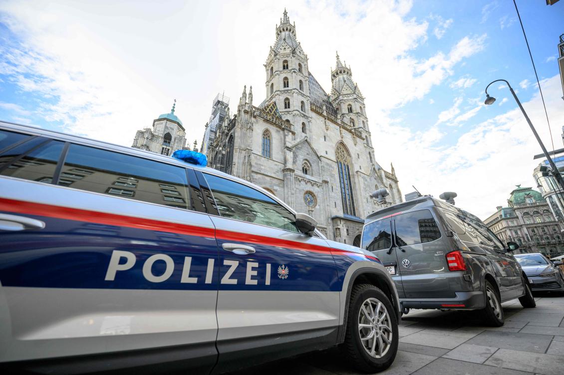 A police car stands near the Stephansdom in Vienna on December 24, 2023. (AFP)