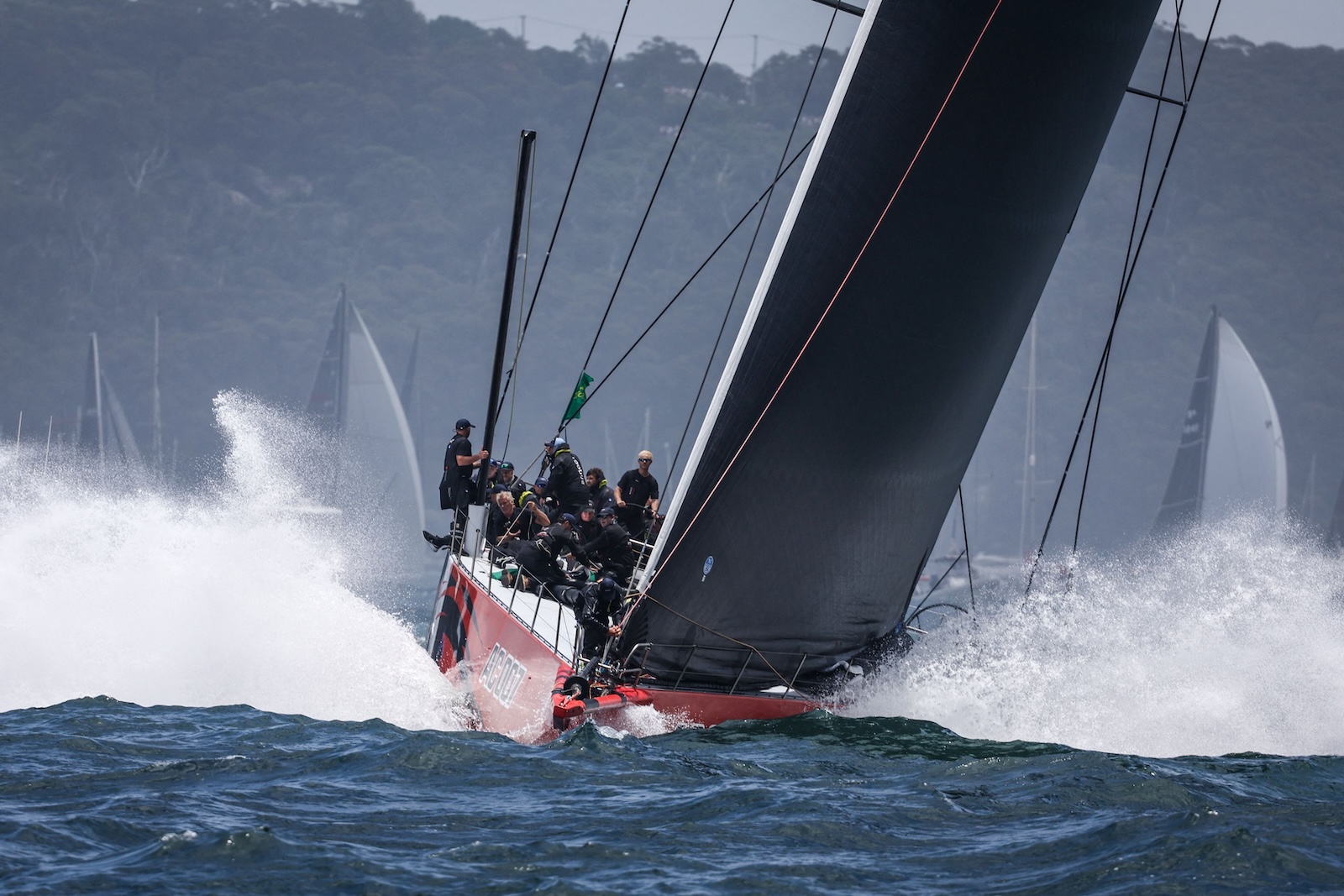 Yacht Andoo Comanche competes during the the start of the annual Sydney to Hobart yacht race on Boxing Day at Sydney Harbour on Dec. 26, 2023. (AFP)