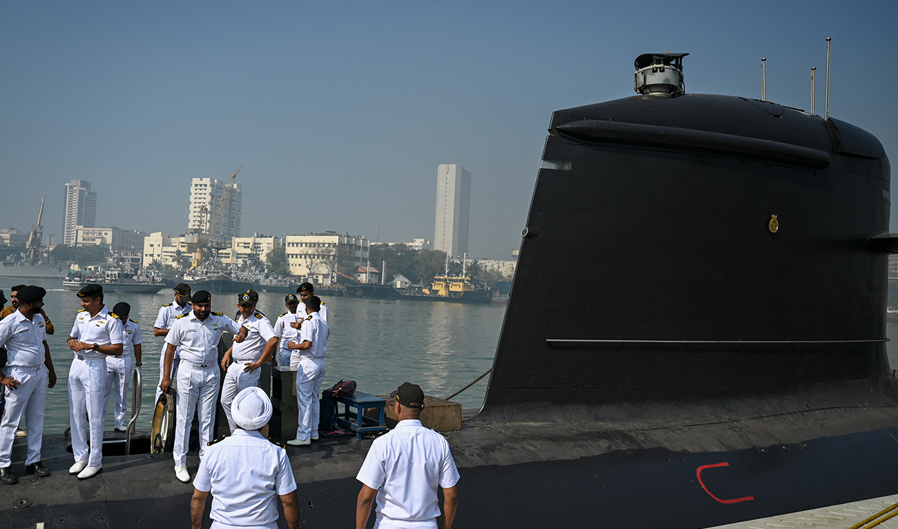 Indian navy officers interact on the deck of fifth Kalvari-Class submarine 'Vagir' anchored at the naval base ahead of its commissioning ceremony in Mumbai January 20, 2023. (AFP/File)