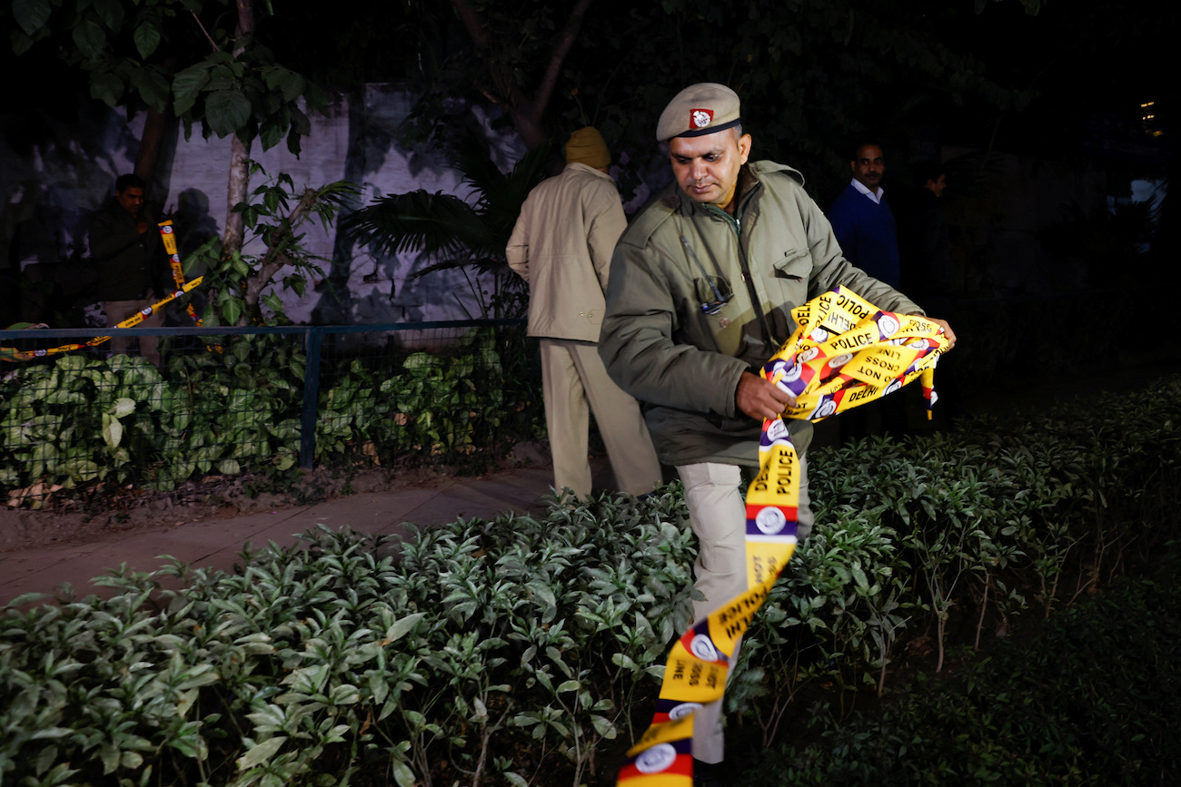A police officer is seen outside the Israeli embassy, following an investigation on a reported explosion nearby, in New Delhi, India, Dec. 26, 2023. (Reuters)