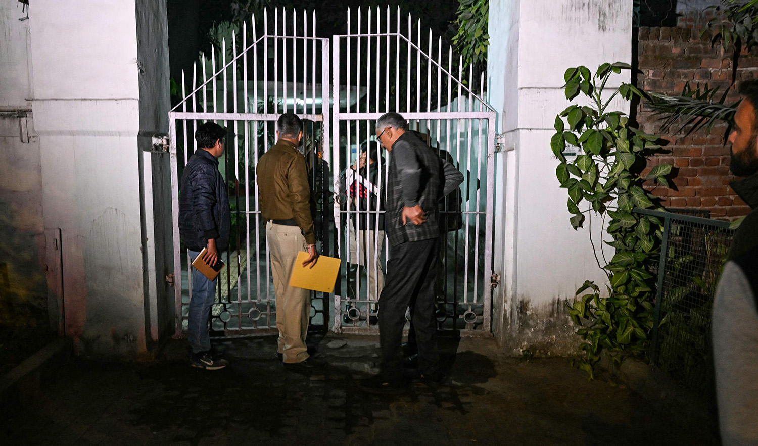 Police personnel conduct an investigation after an alleged explosion took place near the Israeli embassy in New Delhi, India on December 26, 2023. (AFP)