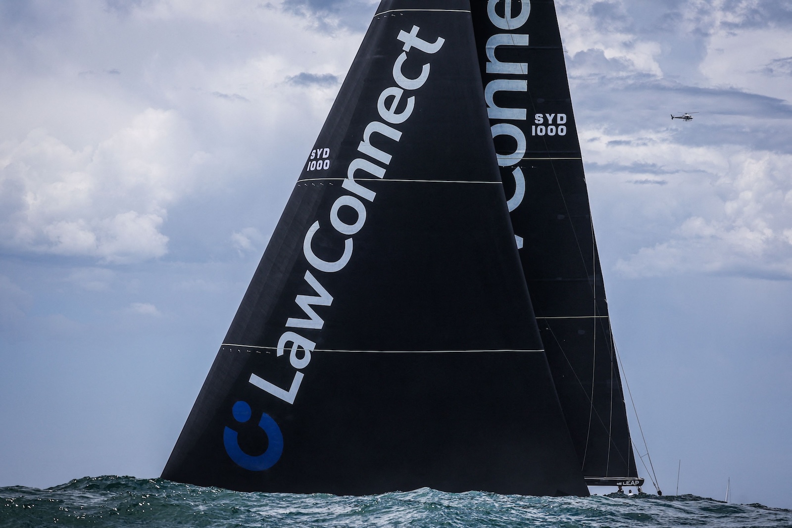 Yacht LawConnect competes during the annual Sydney to Hobart yacht race on Boxing Day at Sydney Harbour on Dec. 26, 2023. (AFP)