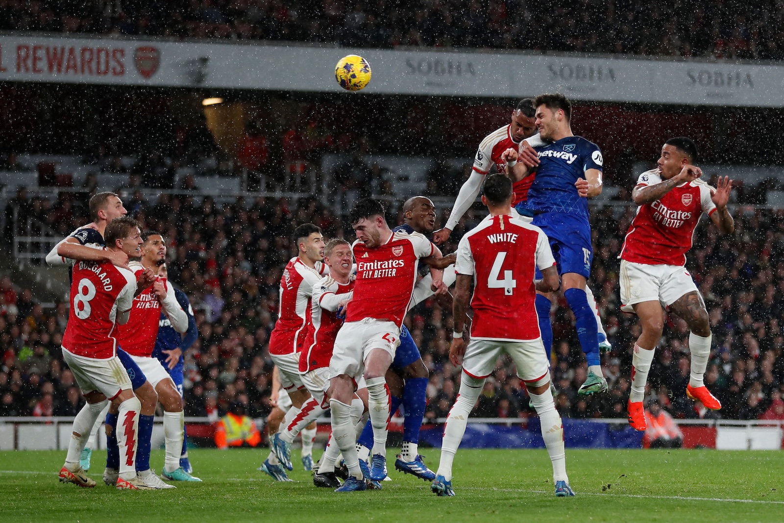 West Ham United's Greek defender Konstantinos Mavropanos heads the ball and scores his team second goal during the English Premier League football match between Arsenal and West Ham United at the Emirates Stadium in London on Dec. 28, 2023. (AFP)
