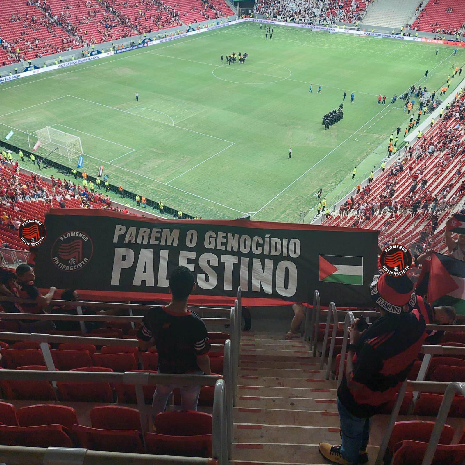 Flamengo Antifascista activists are seen with pro-Palestinian banner in stadium. (Courtesy: Club Deportivo Palestino)