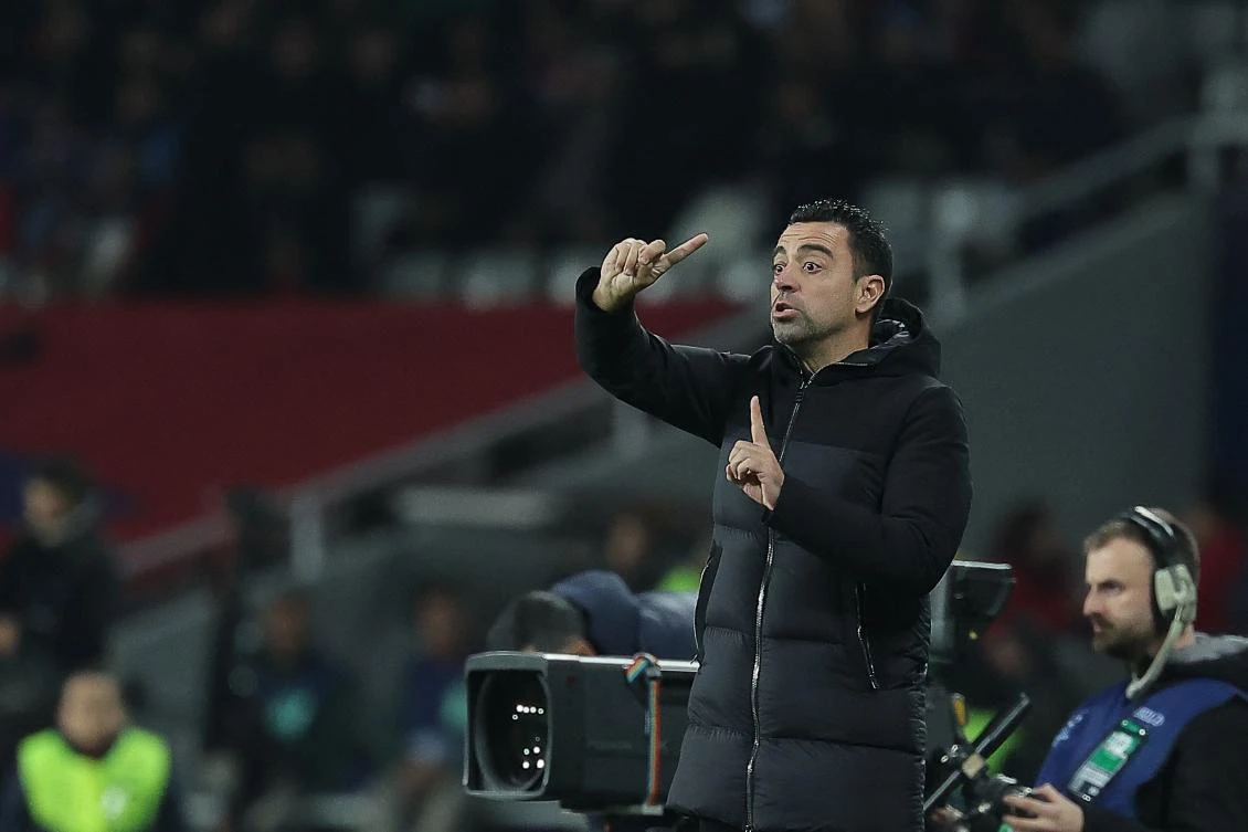 Barcelona’s Spanish coach Xavi gestures during their UEFA Champions League first round group H match against FC Porto at the Estadi Olimpic Lluis Companys in Barcelona on Nov. 28, 2023. (AFP)