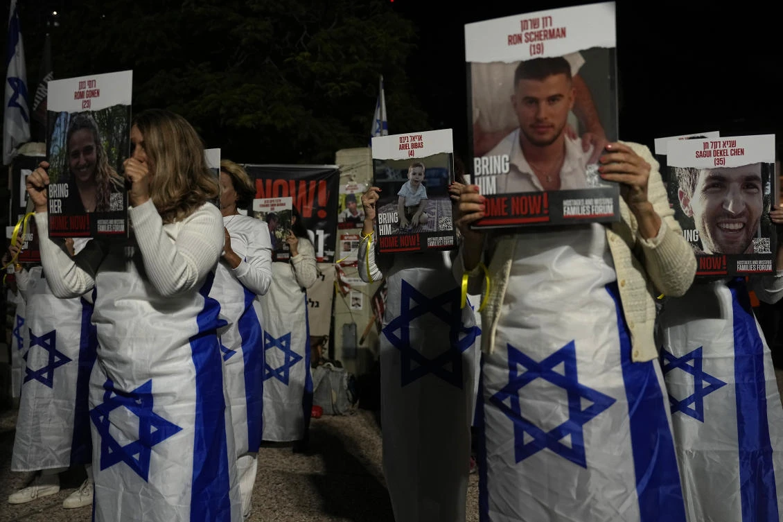 Relatives and friends of hostages held in the Gaza Strip by the Hamas militant group call for their release in the Hostages Square at the Museum of Art in Tel Aviv Dec. 2, 2023. (AP)
