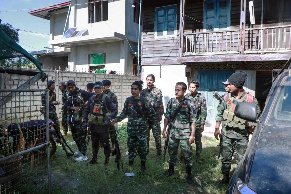 Above, members of the Loikaw People’s Defense Force prepare to go to the frontline near Loikaw in Myanmar’s eastern Kayah state on Nov. 28, 2023. (AFP)