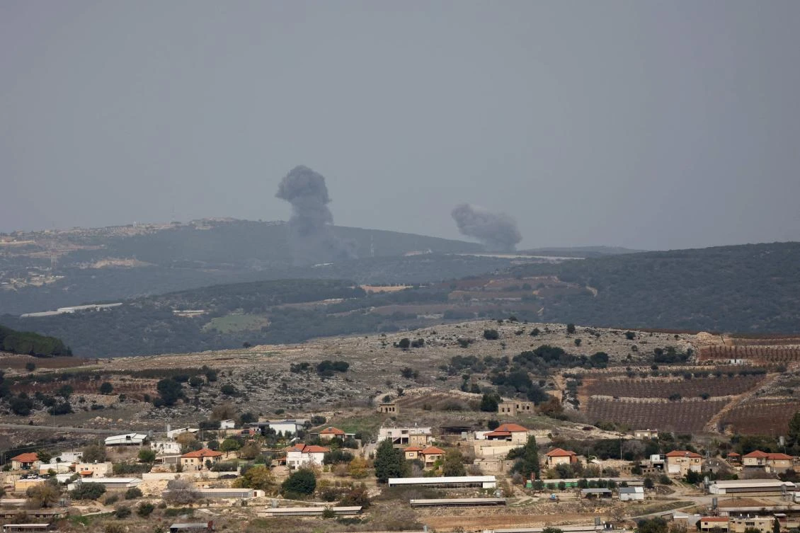 Above, Israeli shelling around the southern Lebanese village of Aita Al-Shaab on Dec. 5, 2023. (AFP)