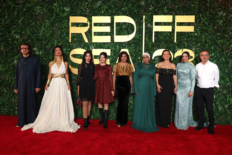 Tunisian director Kaouther Ben Hania (center) saw her movie “Four Daughters” screen at Jeddah’s Red Sea International Film Festival. (Getty Images)
