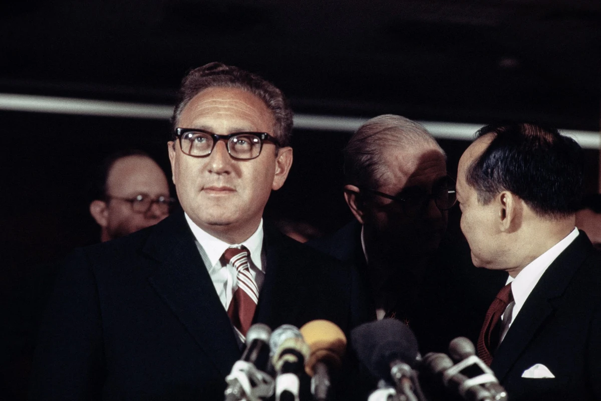 US President Nixon's special advisor Henry Kissinger holds a press conference at Orly airport during his arrival in Paris to attend the Vietnam peace talks on Nov. 20, 1972. (AFP/File)