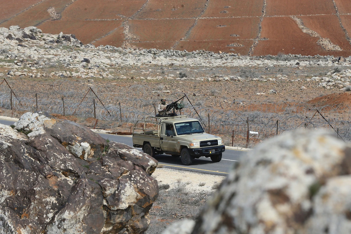 Jordanian soldiers patrol along the eastern Jordan-Syria border, in al-Washash, Mafraq governorate, Jordan, Thursday, Feb. 17, 2022. (AP)