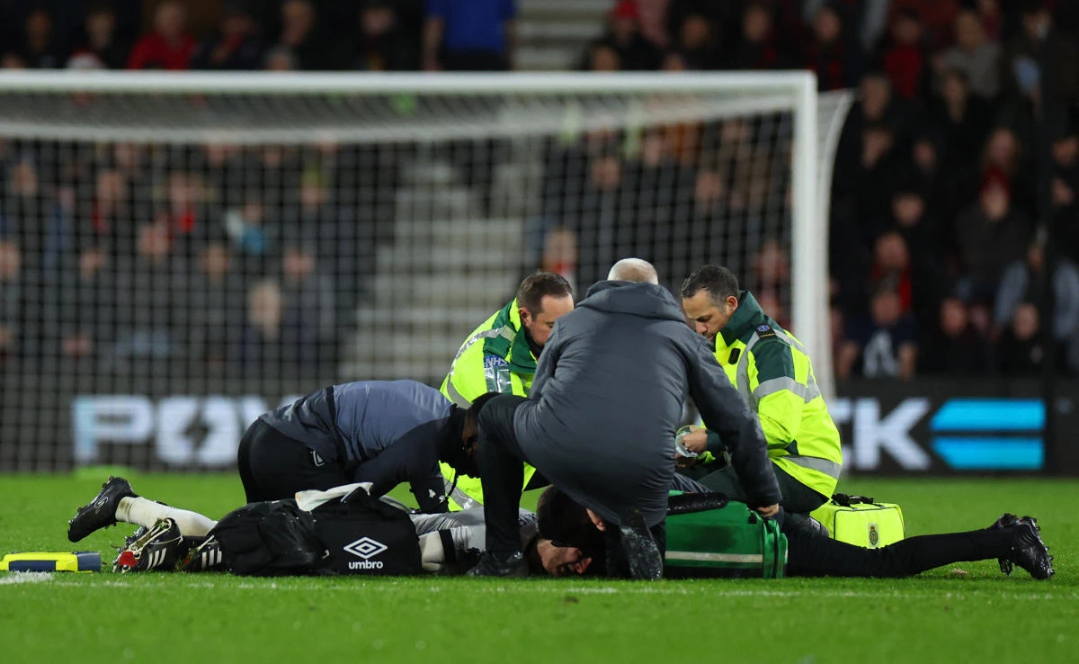 Luton Town’s Tom Lockyer receives medical attention during their Premier League match against AFC Bournemouth at Vitality Stadium, Bournemouth, on Dec. 16, 2023. (Reuters)