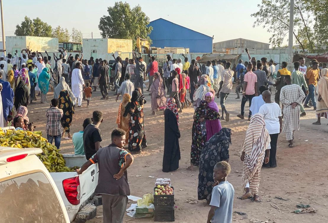 People rally in support of Sudan’s army in Wad Madani on Dec.17, 2023. (AFP)