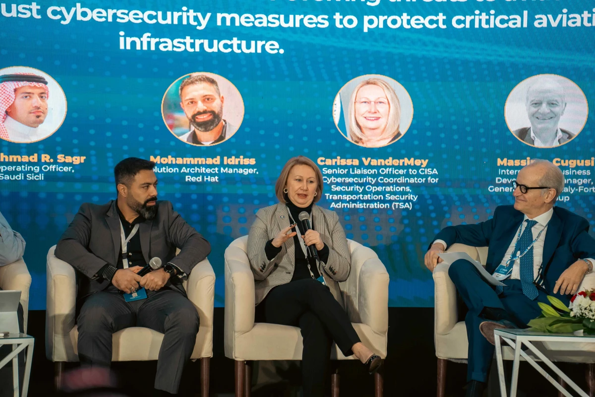 Carissa VanderMey, US Transportation Security Administration’s senior liaison officer and cybersecurity coordinator, center, described the new technology as ‘the future’ due to its increased ability and speed in detecting threats in real-time. AN photo