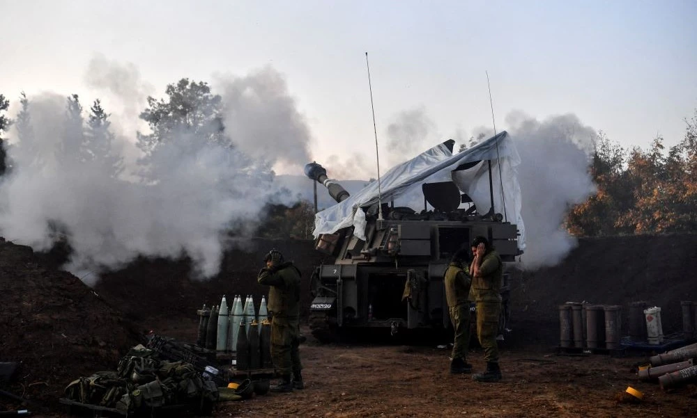 An Israeli artillery unit fires shells into Lebanon, Dec. 19, 2023. (Reuters)