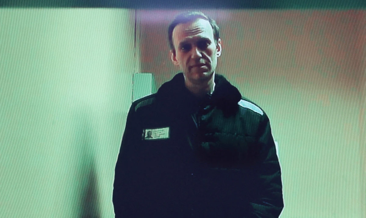 Russian opposition leader Alexei Navalny is seen on a screen via video link from a penal colony in the Vladimir Region during a hearing at the Basmanny district court in Moscow, Russia April 26, 2023. (Reuters)