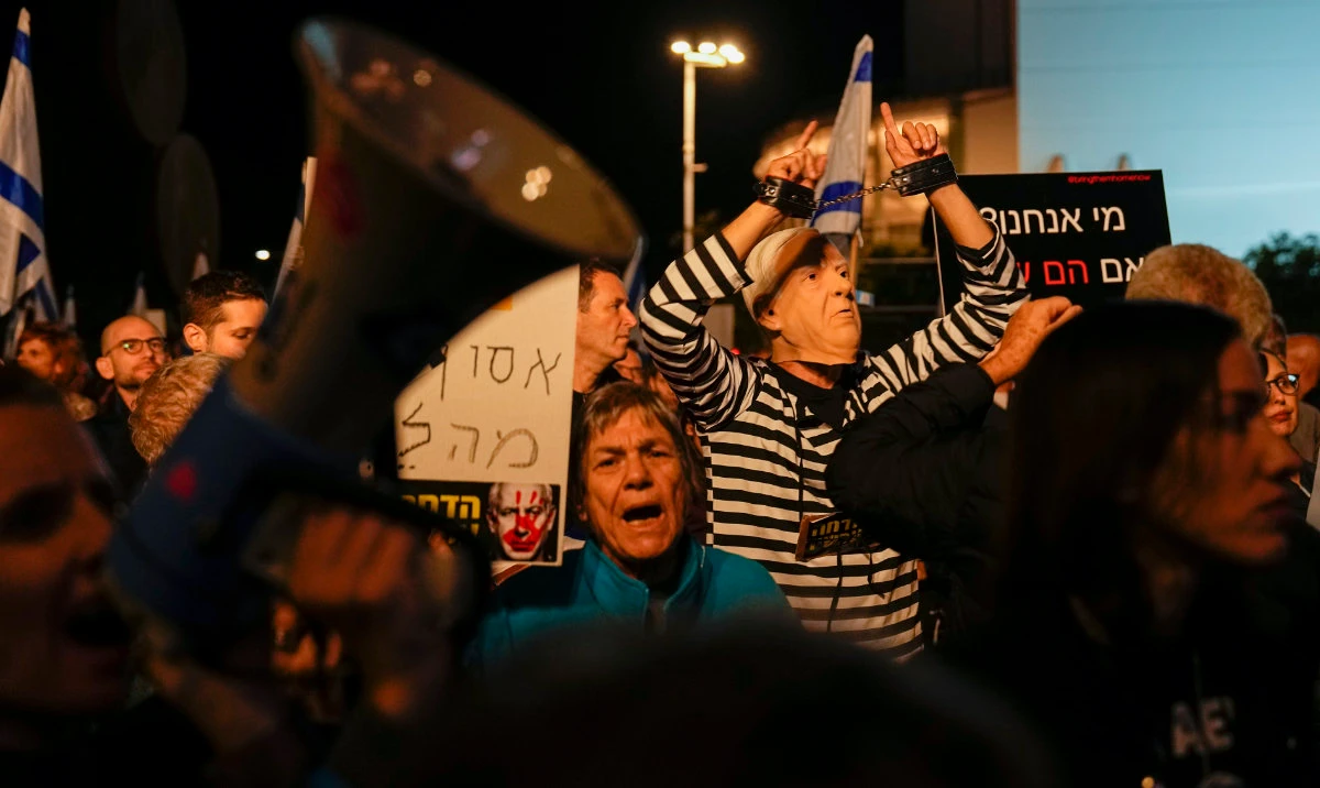 Israelis protest against Prime Minister Benjamin Netanyahu's government in Tel Aviv, Israel, Saturday, Dec. 30, 2023. (AP)