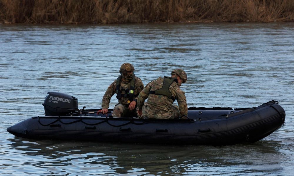 Texas National Guard soldiers patrol the Rio Grande near Shelby Park, Eagle Pass, Texas, Jan. 26, 2024. (AFP)