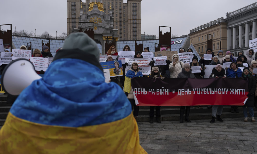 A protester speaks to the crowd, while attending a meeting on Independence square in Kyiv, Ukraine, Jan. 28, 2024. (AP)