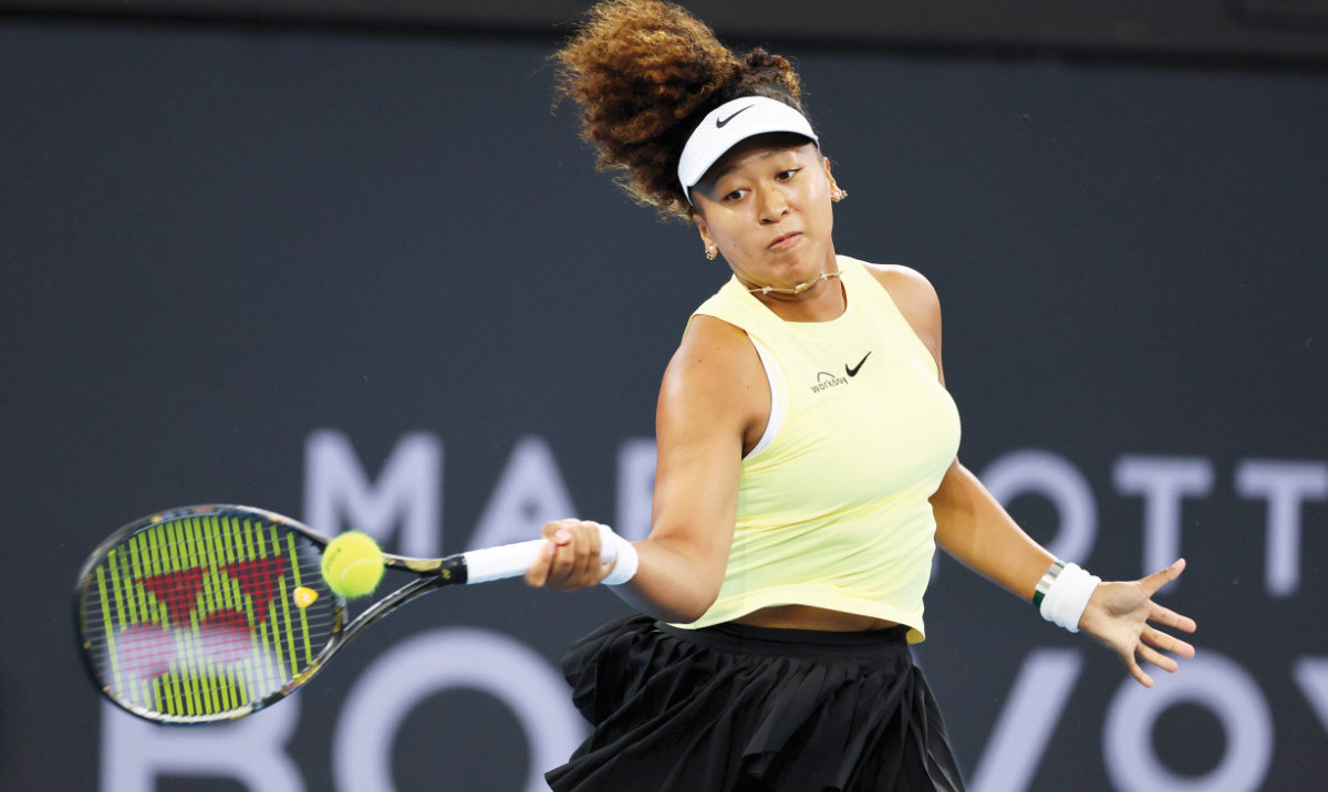 Naomi Osaka of Japan plays a shot in her match against Tamara Korpatsch of Germany during the Brisbane International tennis tournament on Monday. (AP)