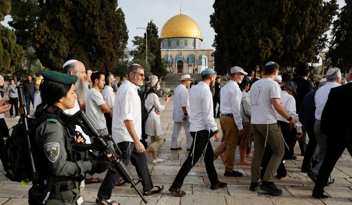Jewish visitors are seen at the compound that houses Al-Aqsa Mosque while tension arises during clashes in Jerusalem's Old City, April 9, 2023. (REUTERS)