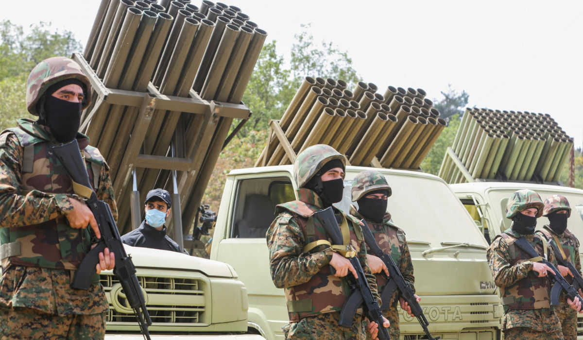 Hezbollah members take part in a military exercise during a media tour organized for the occasion of Resistance and Liberation Day, in Aaramta, Lebanon May 21, 2023. (REUTERS)