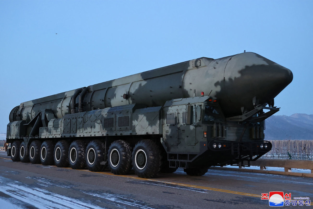 This undated picture released by North Korea's official Korean Central News Agency (KCNA) on December 19, 2023 shows a "Hwasongpho-18" type intercontinental ballistic missile (ICBM) on a mobile launcher at an undisclosed location in North Korea. Russia has reportedly began using North Korean missiles in its war against Ukraine. (KCNA VIA KNS / AFP)