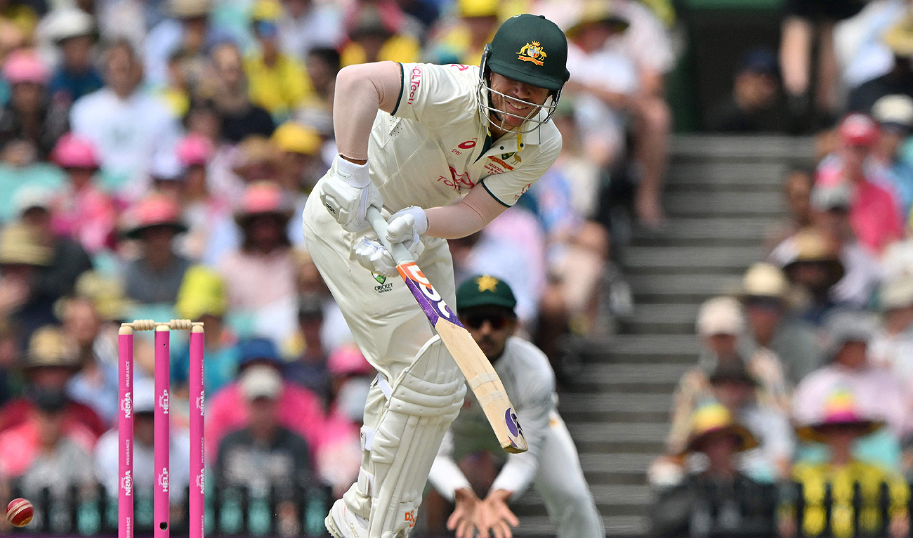 Australia's David Warner plays a shot during the second day of the third cricket Test match between Australia and Pakistan at the Sydney Cricket Ground in Sydney on January 4, 2024. (AFP)