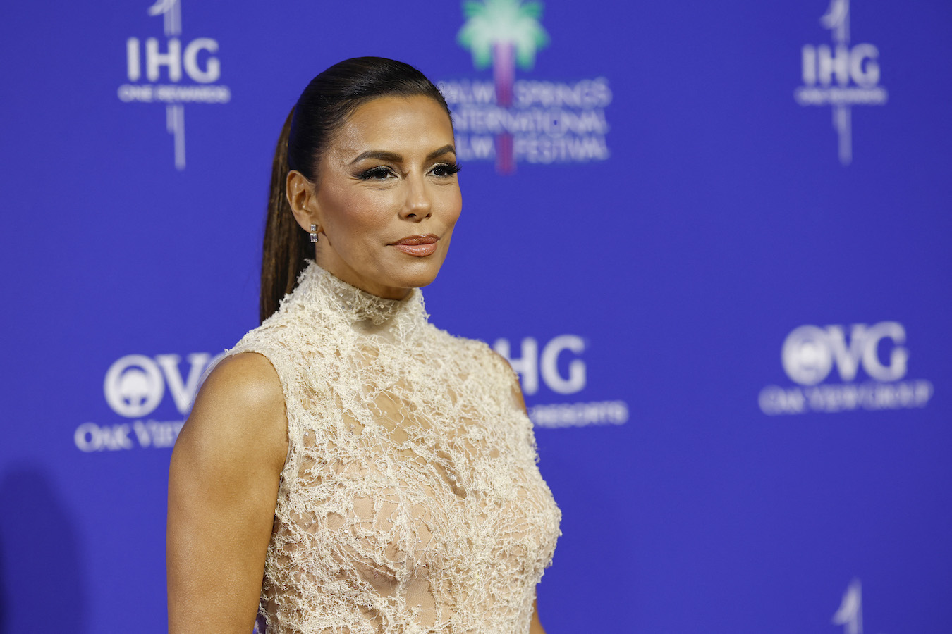 The actress showed off her figure in an off-white floor-length sheer gown. (AFP)