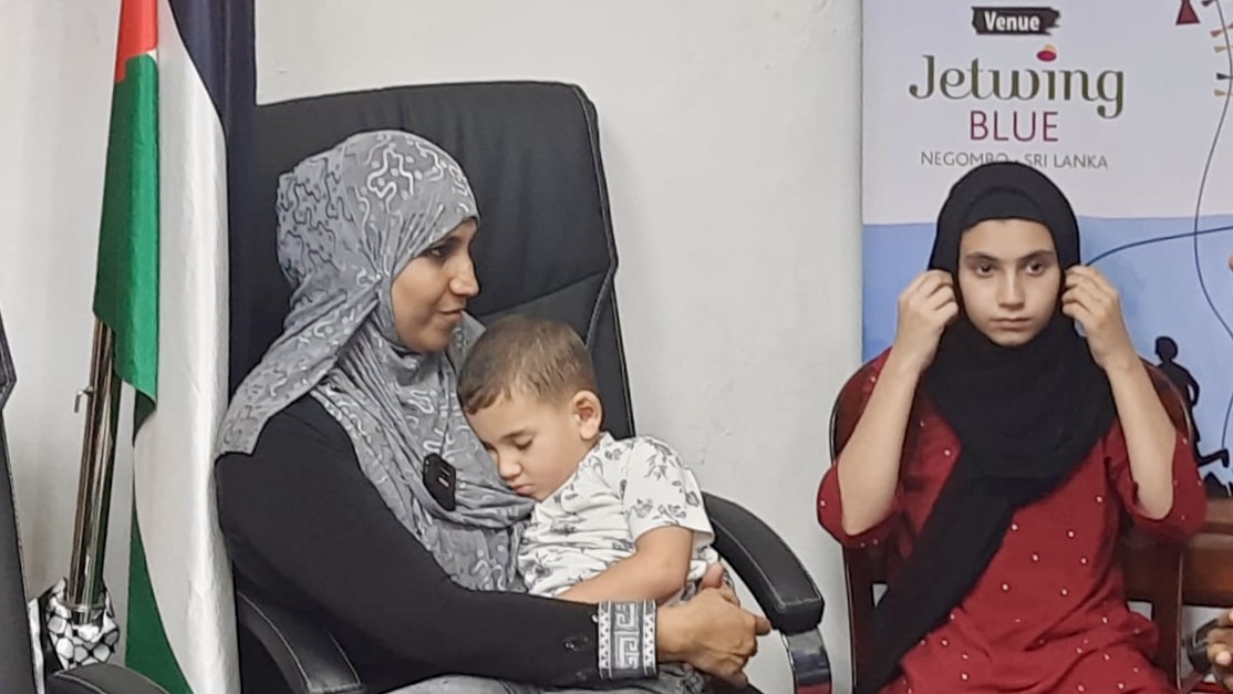 Sri Lankan national Fathima Rikaza and her Palestinian children, who were evacuated from Gaza in November, visit Palestine’s embassy in Colombo on Jan. 2, 2024. (AN Photo)