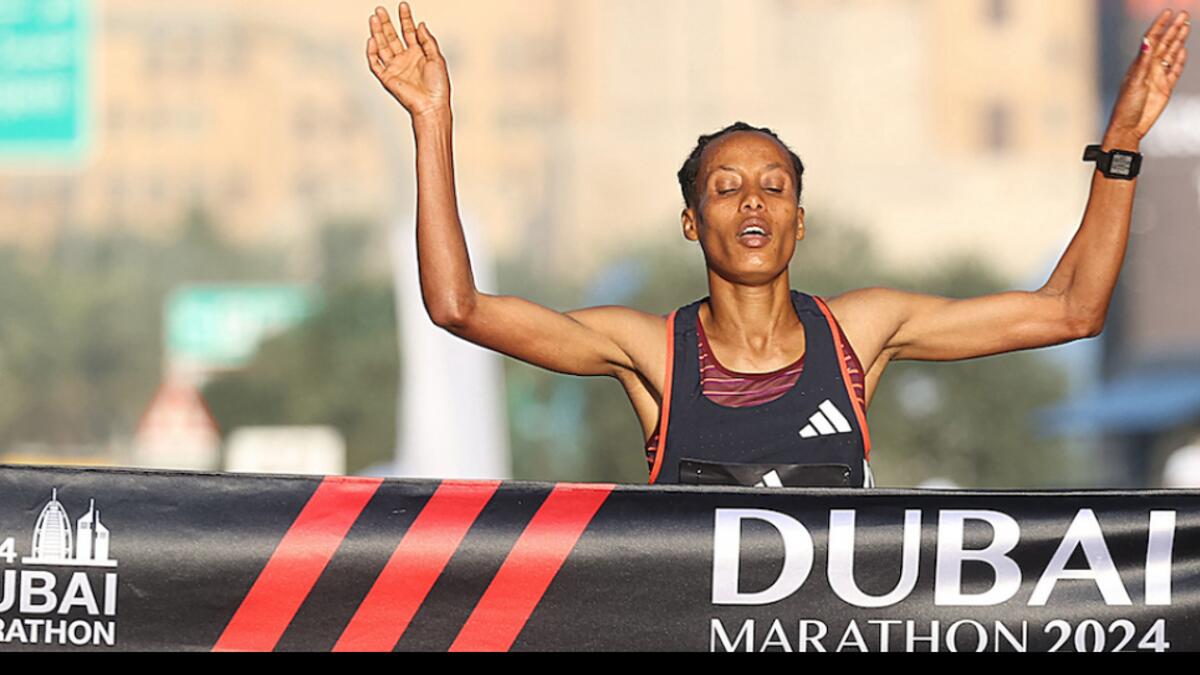 Tigist Ketema celebrates after reaching the finish line in Dubai on Sunday. (Dubai Marathon)