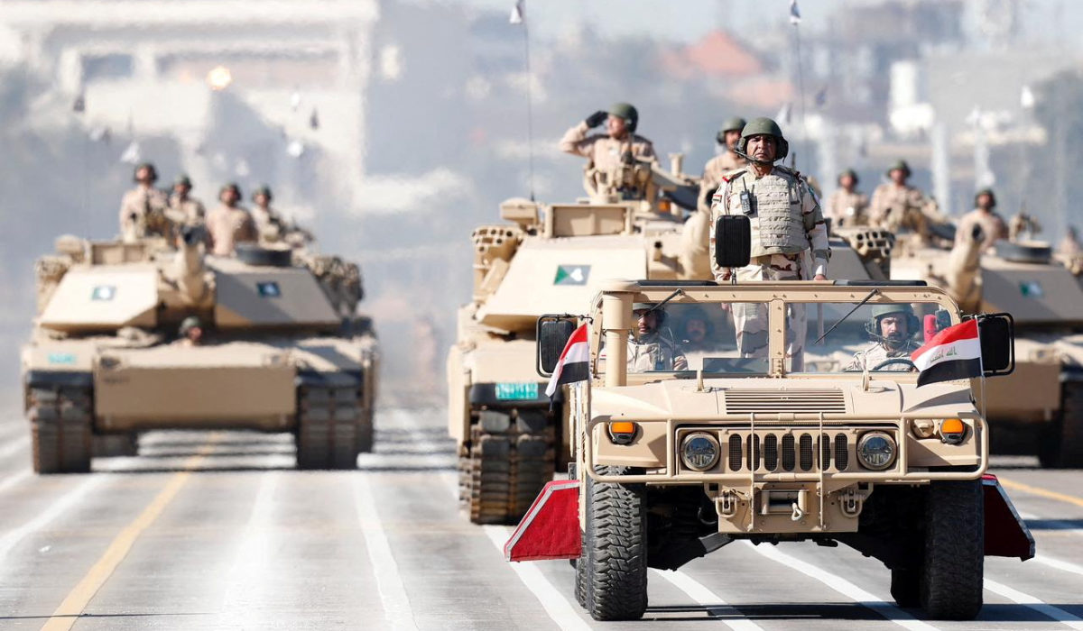 Iraqi soldiers attend a military parade at the Green Zone in Baghdad on Saturday to celebrate the 103rd anniversary of the founding of the Iraqi army. (Reuters)