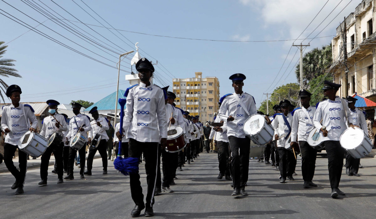 Police band members take part in a march against the Ethiopia-Somaliland port deal in Mogadishu, Somalia. The port agreement has raised tensions in the Horn of Africa. (Reuters)