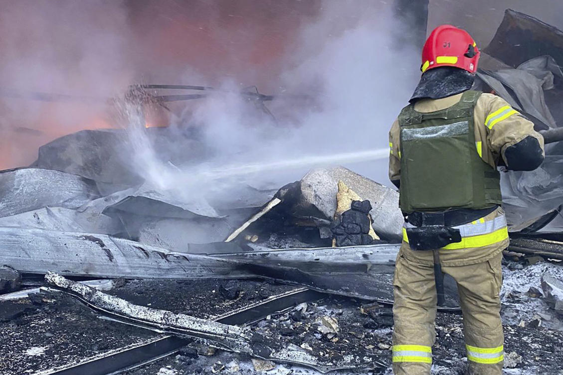 Firefighter works to extinguish a fire after a Russian missile attack in Kryvyi Rih, Ukraine. (Ukrainian Emergency Service via AP)