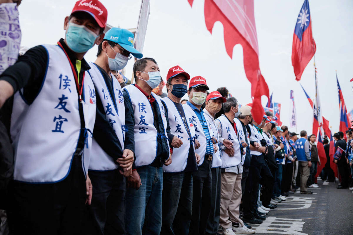 Supporters of Taiwan’s main opposition Kuomintang during a rally in Kaohsiung. Taiwan says China is exerting military pressure to interfere in the elections. (AFP)
