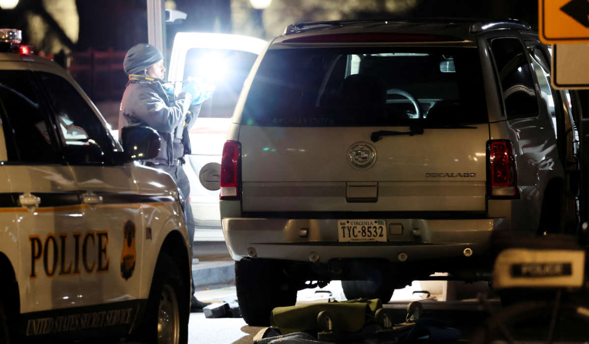 A member of the U.S. Secret Service works at the site of a vehicle crash on a perimeter gate of the White House, while U.S. President Joe Biden was away on a trip, in Washington, U.S., January 8, 2024. (REUTERS)