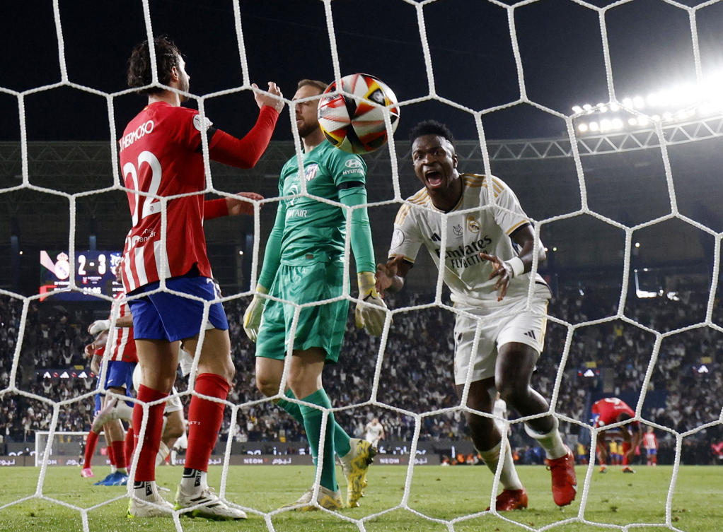 Real Madrid’s Vinicius Junior celebrates after Dani Carvajal scored their third goal during their Spanish Super Cup semifinal match against Atletico Madrid at Al-Awwal Park, Riyadh, on Jan. 10, 2024. (Reuters)