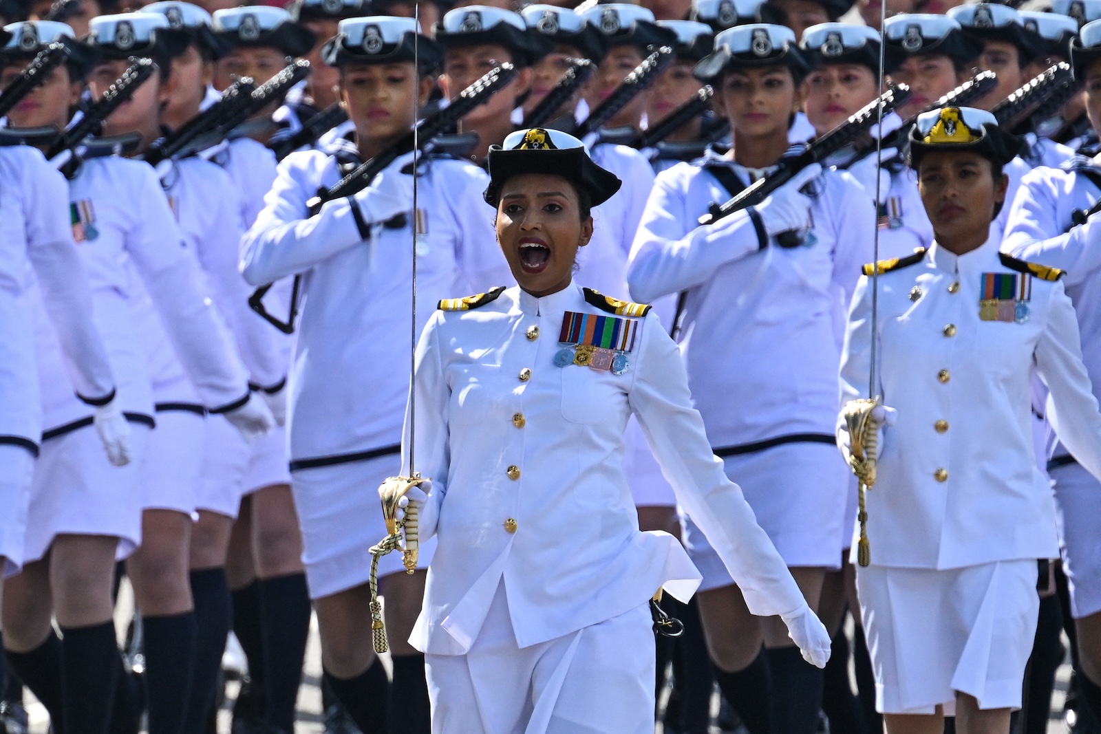 Sri Lanka Navy sailors march during 75th Independence Day celebrations in Colombo on Feb. 4, 2023. (AFP)