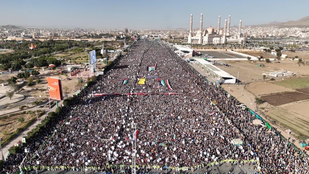 Houthi movement supporters rally to denounce air strikes launched by the U.S. and Britain on Houthi targets, in Sanaa, Yemen January 12, 2024. (AFP)