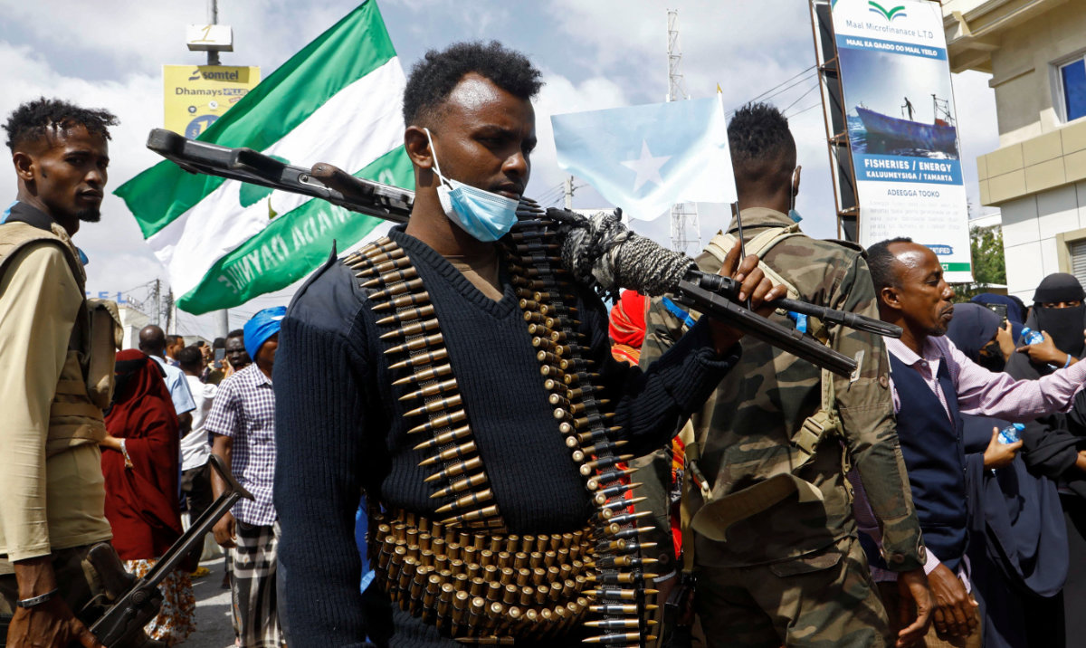 A Somali police officer stands guard during a march against the Ethiopia-Somaliland port deal along KM4 street in Mogadishu, Somalia January 11, 2024. (Reuters)