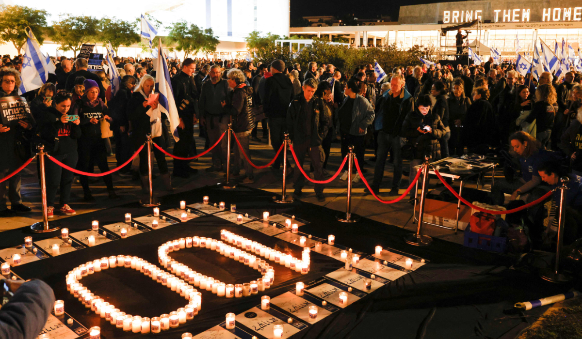 People gather in Habima square in central Tel Aviv, to protest against the Israeli government, as the war between Israel and the Palestinian movement nears 100 days, on January 13, 2024. (AFP)