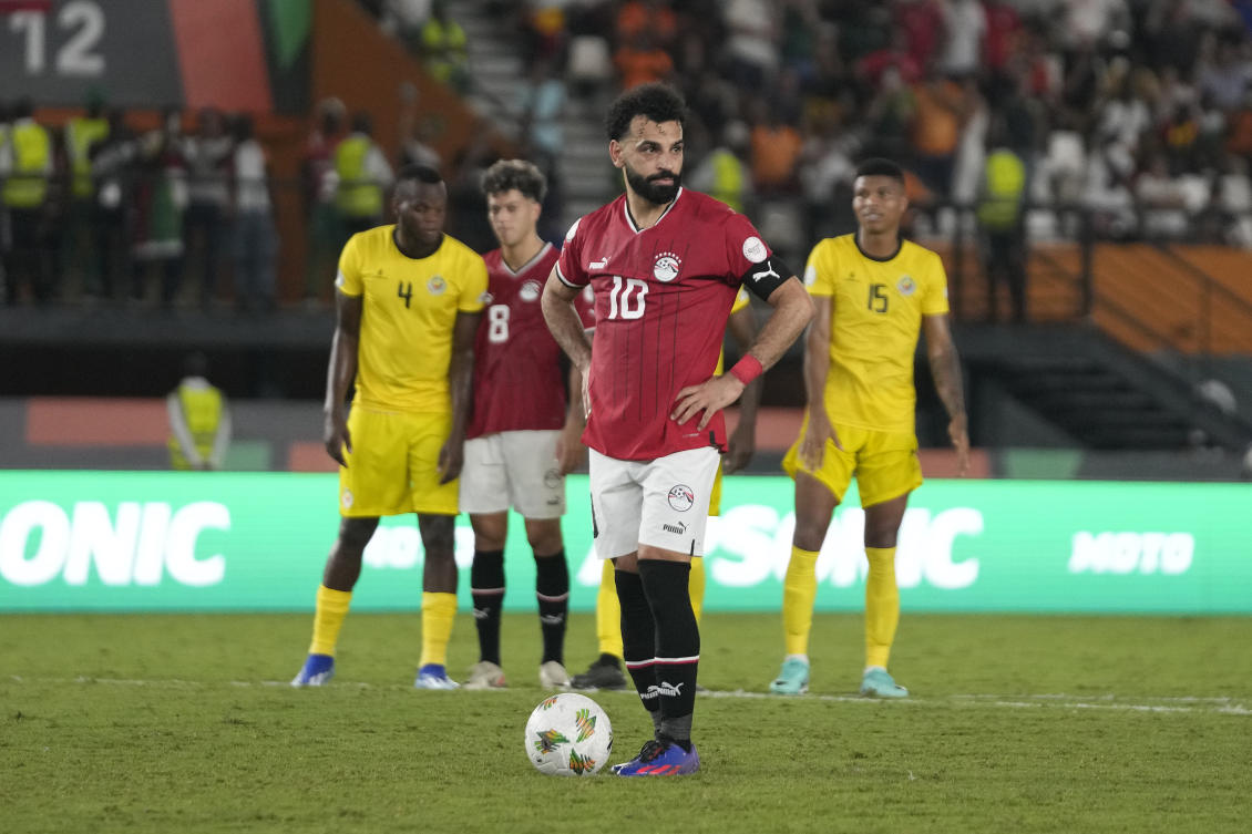 Egypt’s Mohamed Salah waits to take a penalty, which he scores for his side, during the African Cup of Nations Group B soccer match between Egypt and Mozambique in Abidjan, Ivory Coast, Sunday, Jan. 14, 2024. (AP)