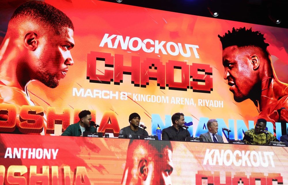 British heavyweight boxer Anthony Joshua, 2nd left, and French-Cameroonian boxer Francis Ngannou, right, attend a press conference in London on January 15, 2024, ahead of their fight in March. (AFP)